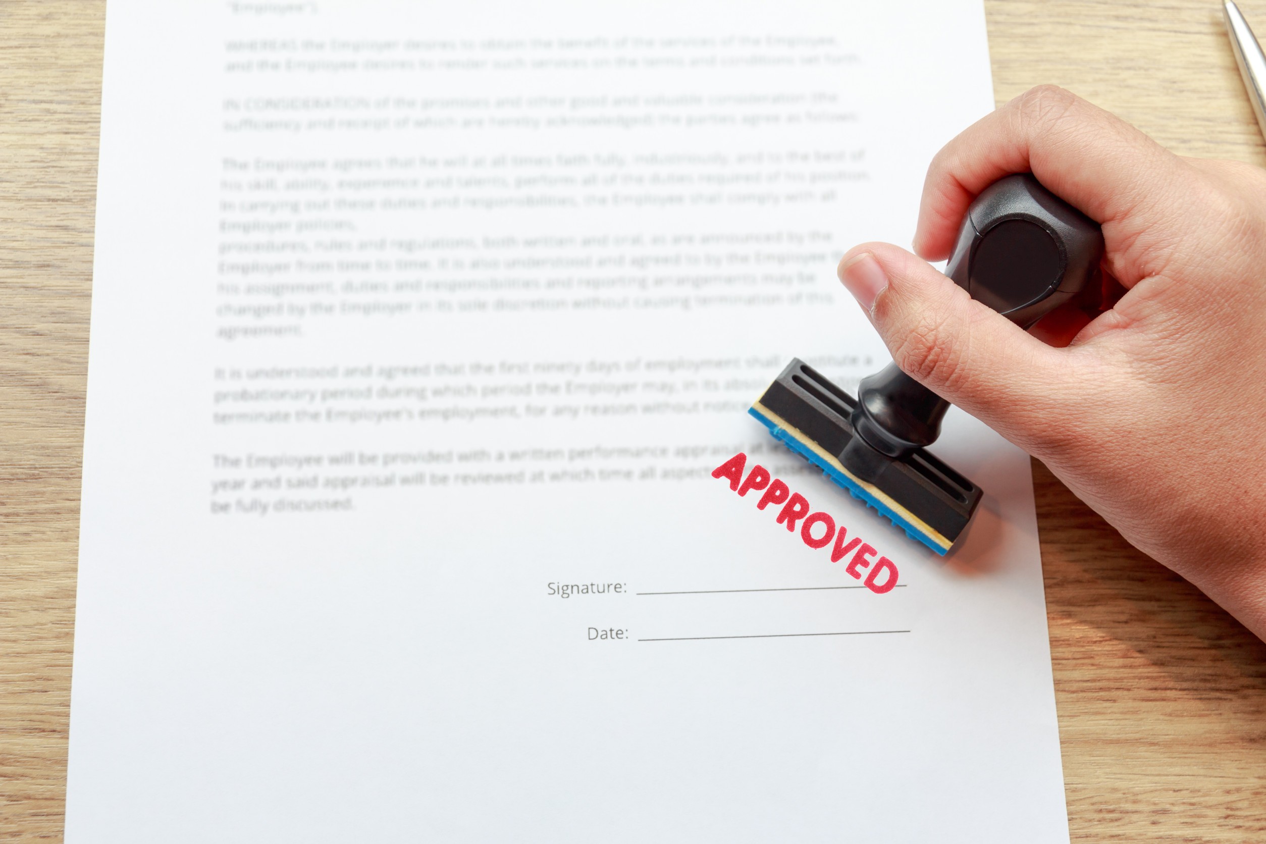 Approved the contract documents with rubber stamp concept