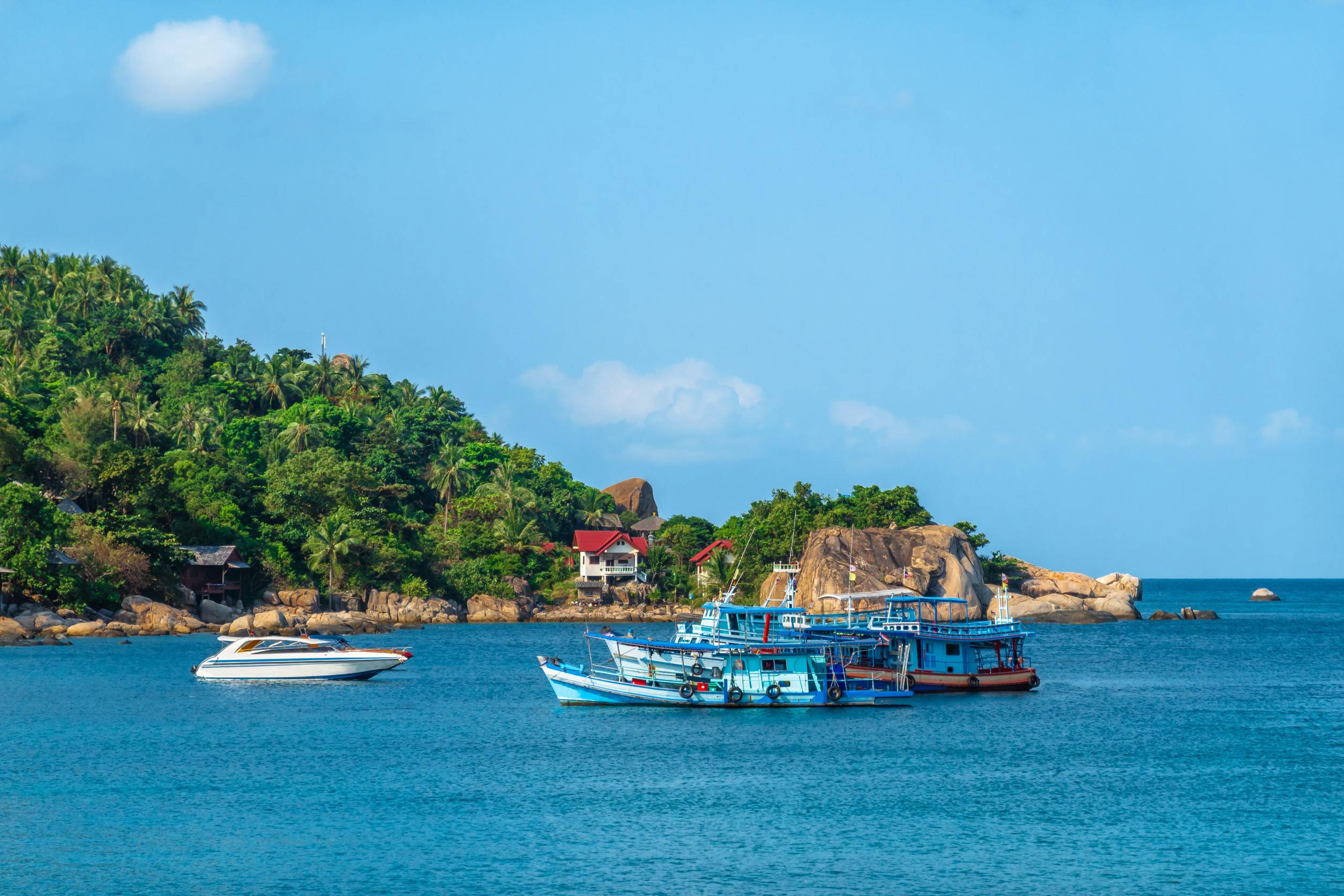 Small fishing boat is out fishing fishermen is a career that has been popular in the seaside island